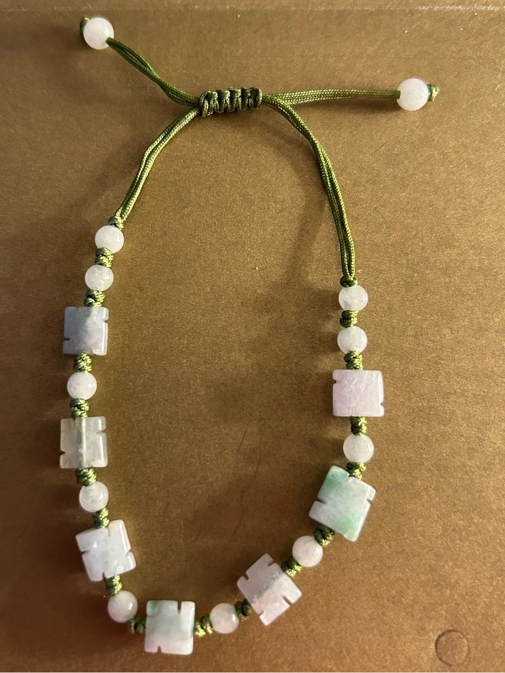 NWOT Bracelet Carved Jade Green round & notched beads adj. Macrame green cord
